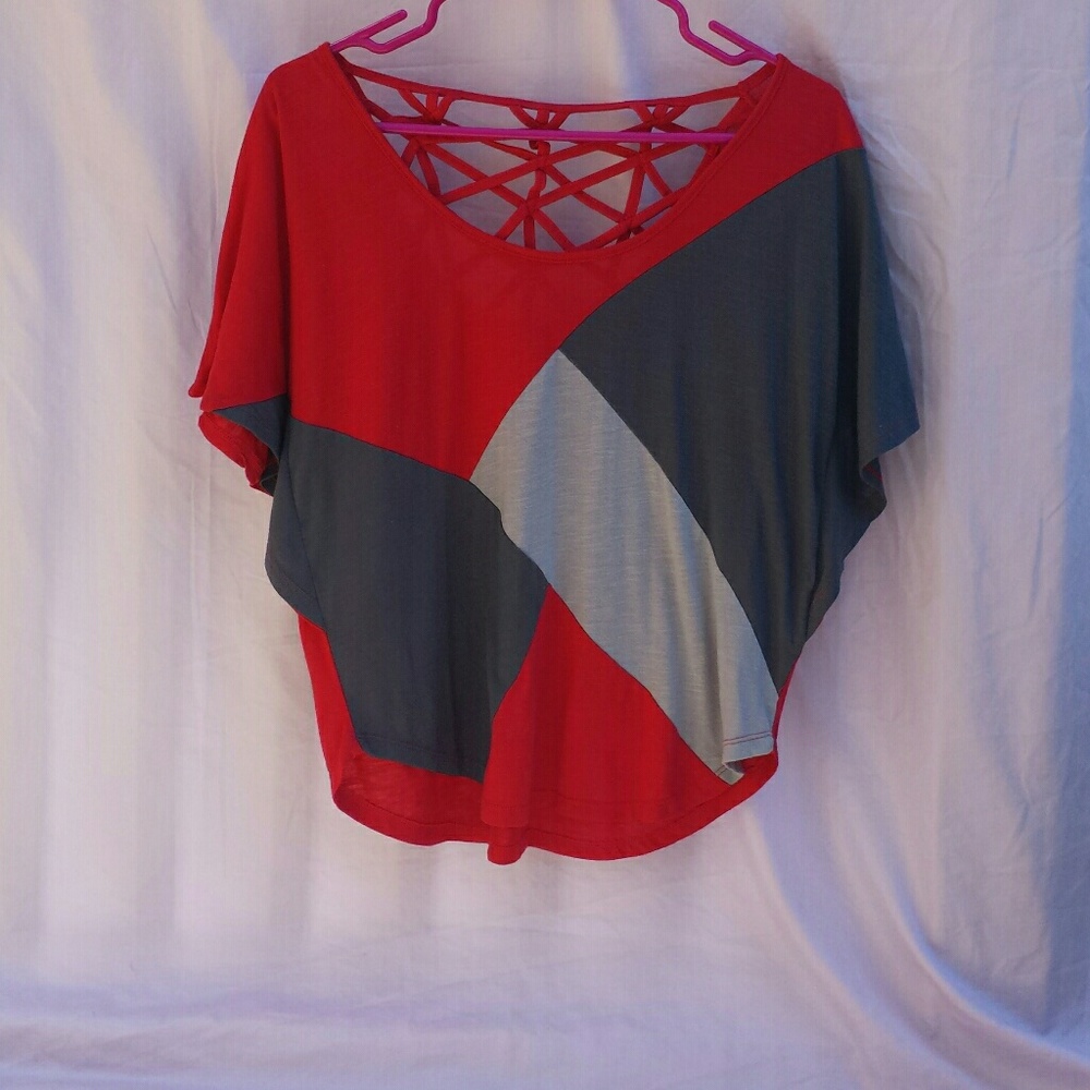 Red and grey top.